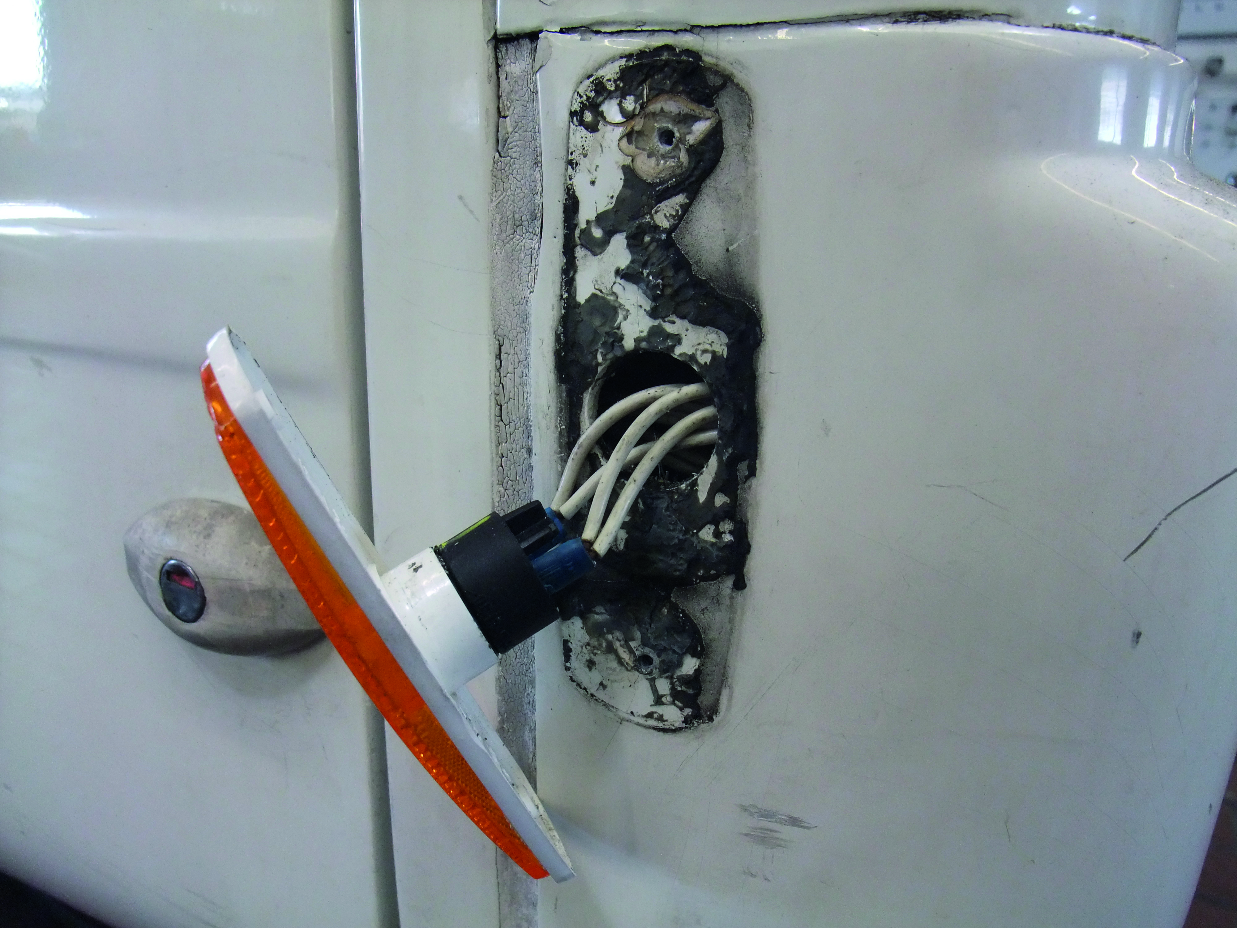 Réparation du feu de position latéral