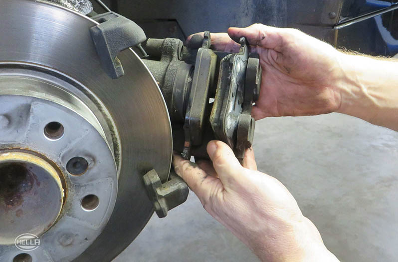 Remove the brake caliper from the brake anchor plate