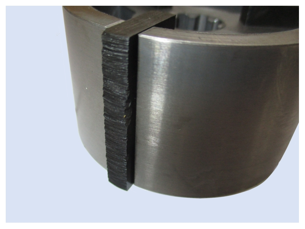 Aanzienlijke slijtage aan de rotor van de vacuümpomp door onvoldoende smering.